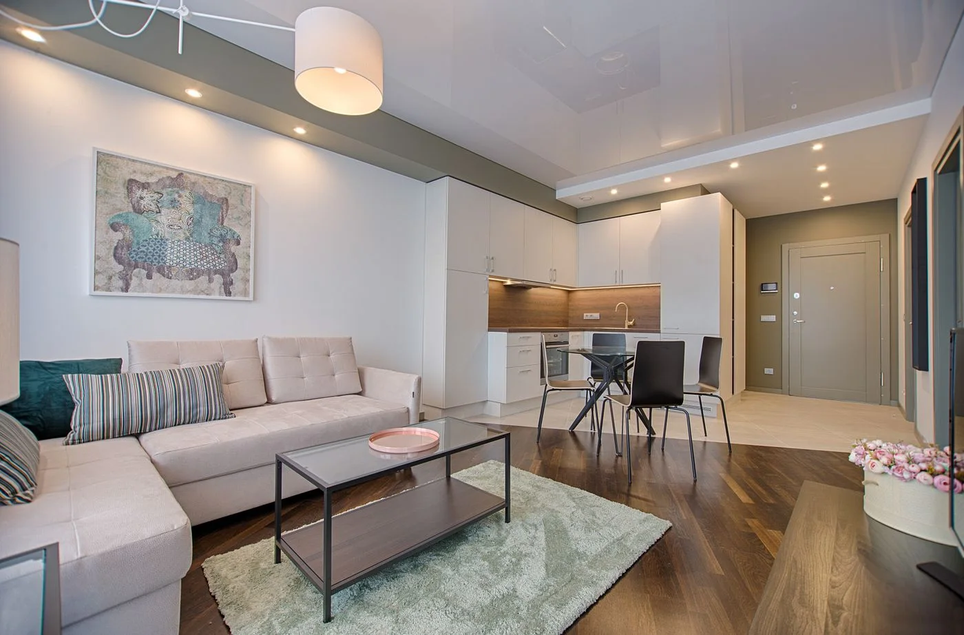 Living room with neutral furniture and layered textiles