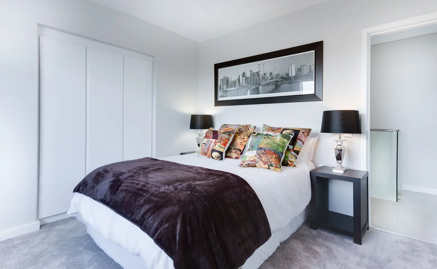 Bedroom arranged with a bed and surrounding furniture